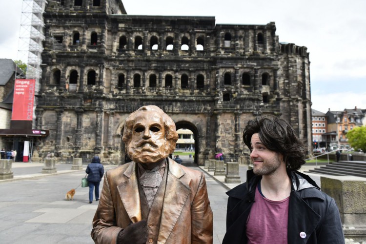 The young Marx in front of the Porta Nigra