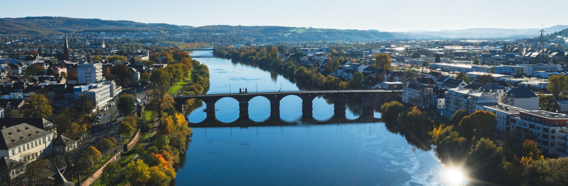 Luftbild Trier mit Mosel und Römerbrücke - © Victor Beusch / Trier Tourismus und Marketing
